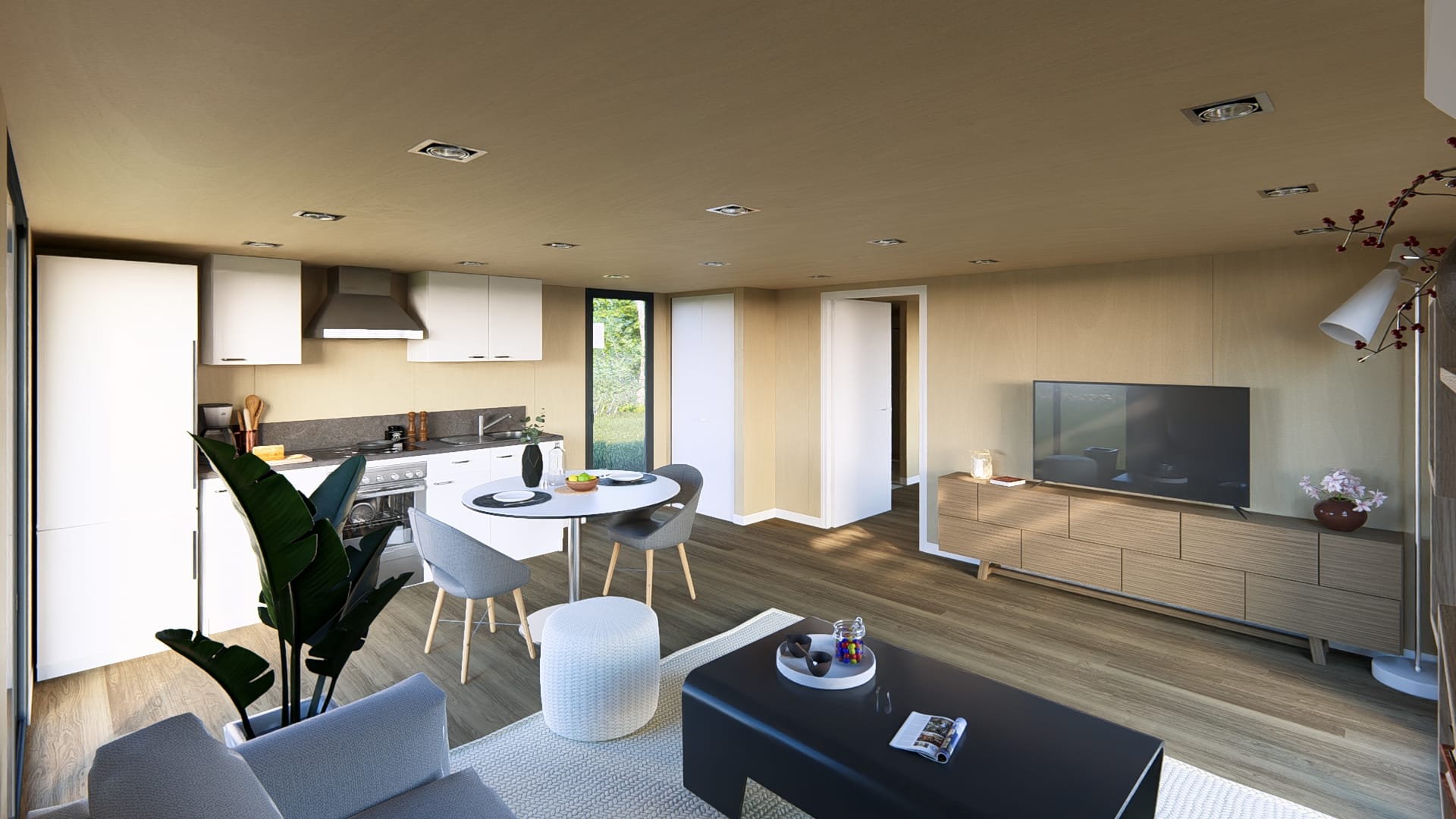 Intérieur moderne d'un module en bois avec espace de vie ouvert combinant cuisine, salle à manger et salon.