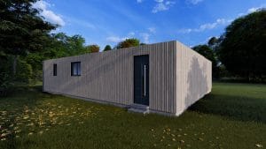 Module en bois moderne avec bardage vertical gris clair, intégré dans un environnement naturel verdoyant.