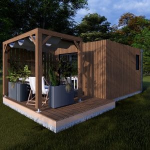 Module en bois moderne "Le Nest" avec terrasse couverte et espace détente en pleine nature.