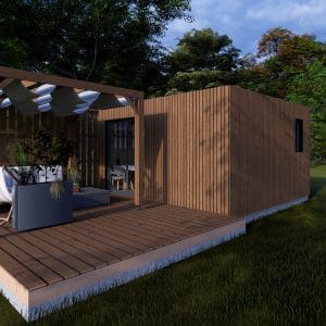 Module en bois contemporain avec terrasse couverte et pergola, intégré dans un environnement verdoyant.