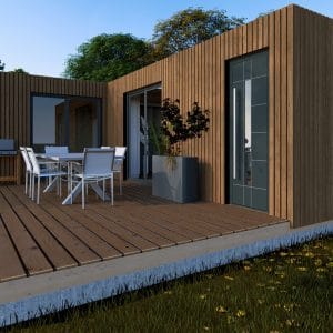 Module en bois contemporain avec terrasse aménagée dans un cadre naturel verdoyant.
